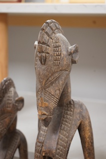 Three African tribal figural carvings including one Dogon maternity figure, largest 82cm. Condition - some cracking